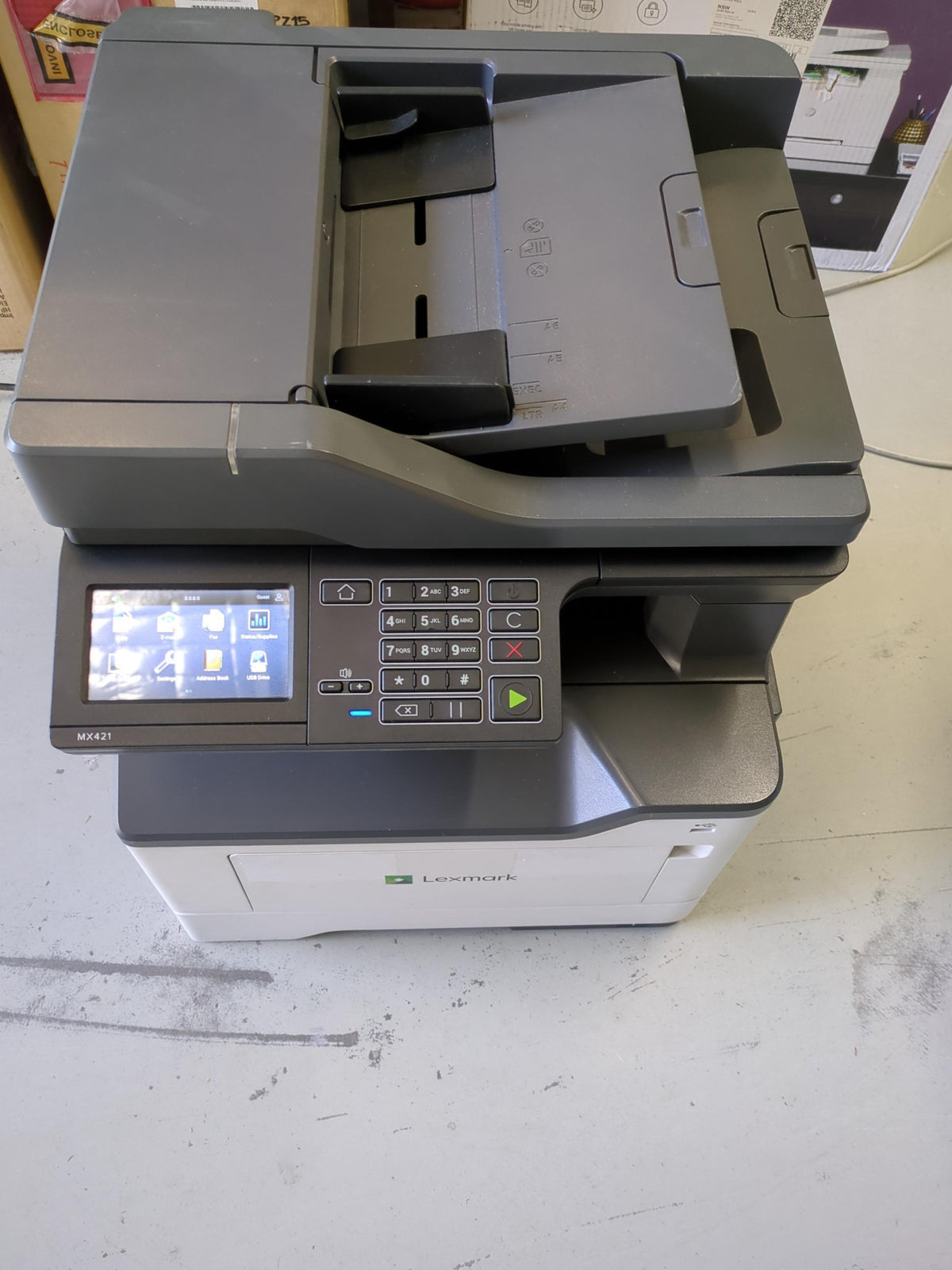 Used Lexmark MX421ade unit with 276,143 pages and extra paper tray - front view