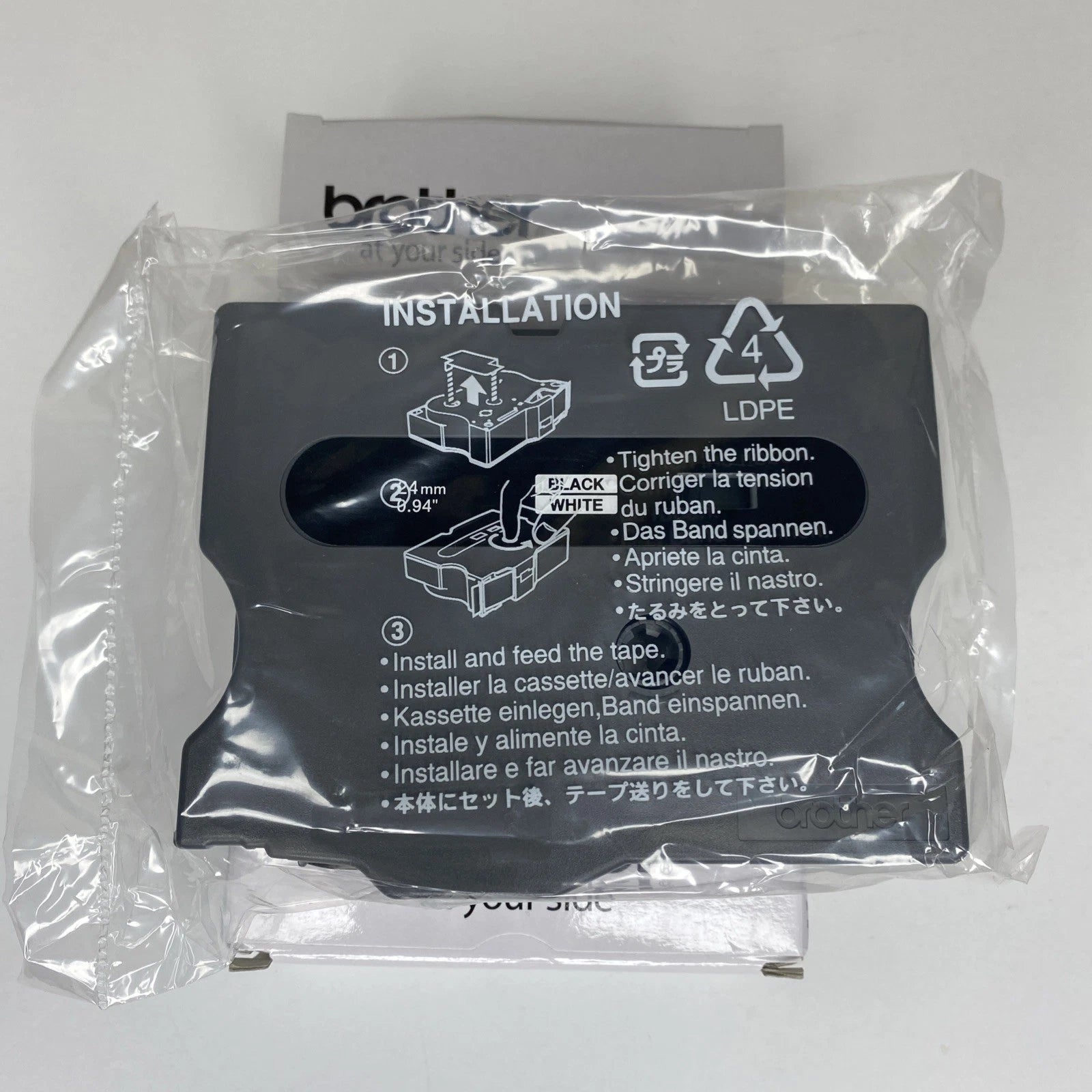 Genuine Brother TX-251 laminated labelling tape 24mm 15m black-on-white for PT7000 PT8000 PTPC [TX2511]